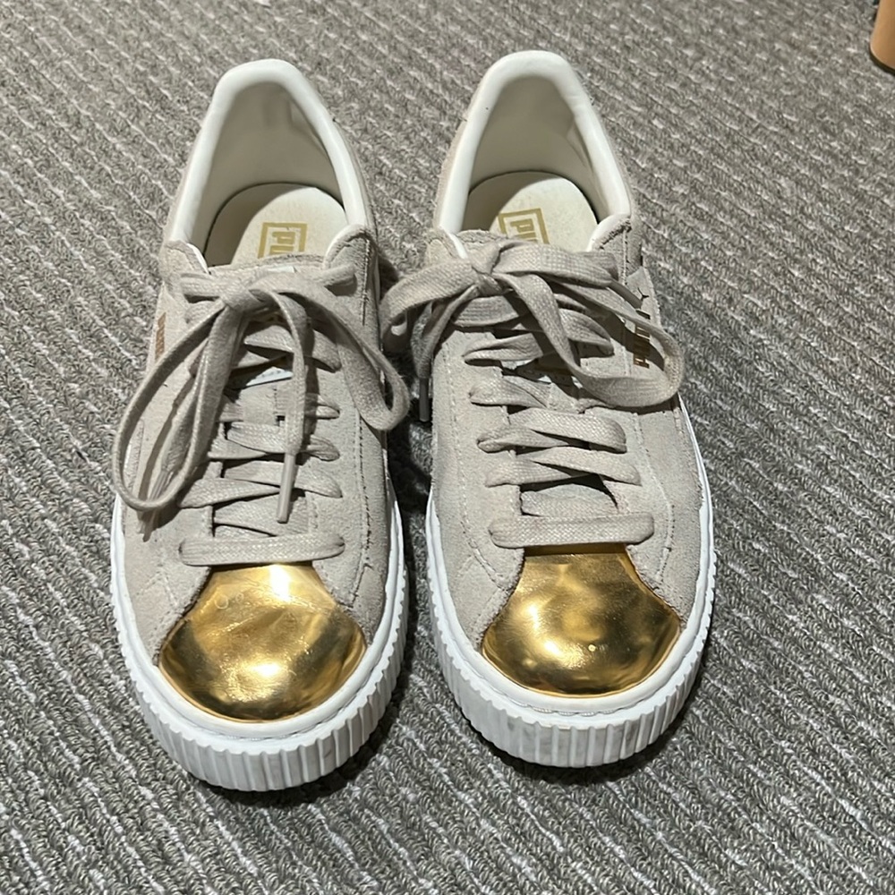 Puma gold toe sneakers